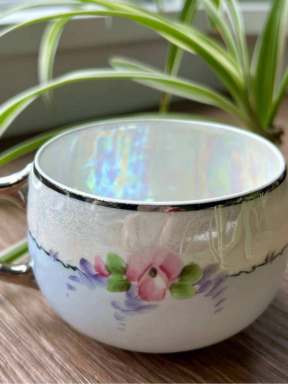Iridescent Floral Porcelain Teacup with Silver Rim by Oakland Studio